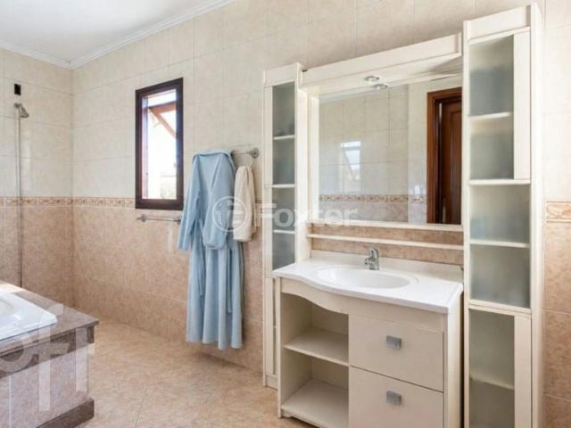 Casa / Sobrado para Venda em Porto Alegre/RS Cavalhada 3 Quartos
