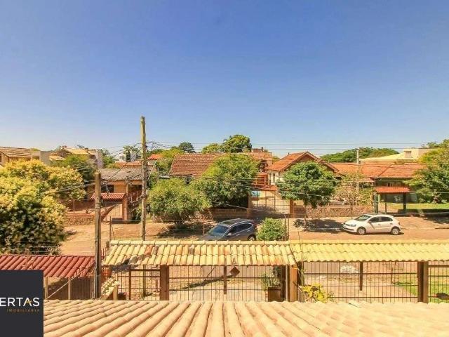 Casa / Sobrado para Venda em Porto Alegre/RS Cavalhada 3 Quartos