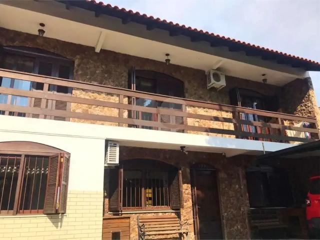 Casa / Sobrado para Venda em Porto Alegre/RS Cavalhada 4 Quartos