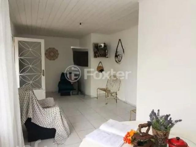 Casa / Sobrado para Venda em Porto Alegre/RS Cavalhada 4 Quartos