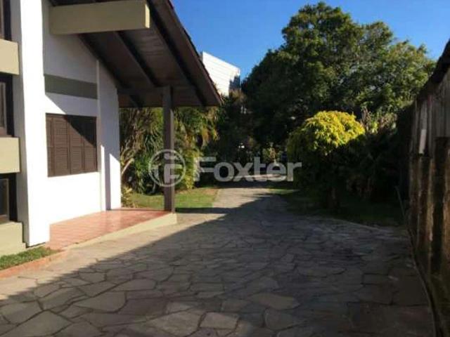 Casa / Sobrado para Venda em Porto Alegre/RS Cavalhada 4 Quartos
