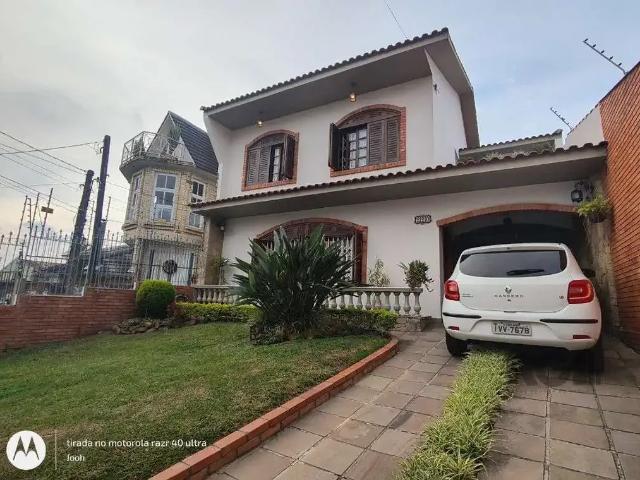 Casa / Sobrado para Venda em Porto Alegre/RS Cavalhada 4 Quartos