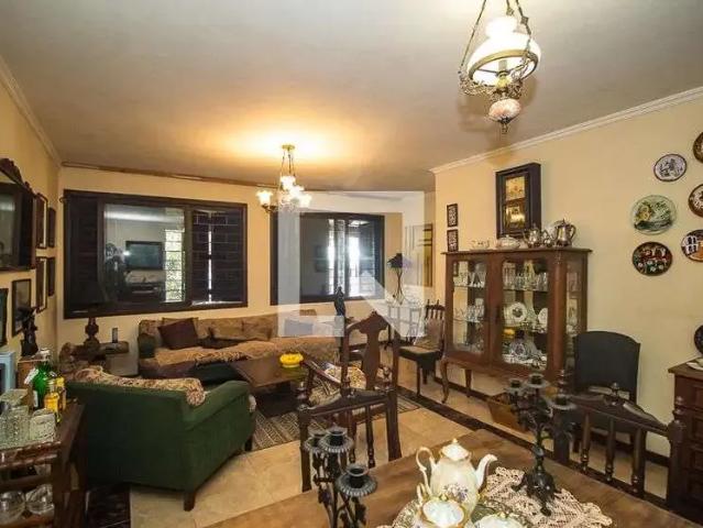 Casa / Sobrado para Venda em Porto Alegre/RS Cavalhada 4 Quartos