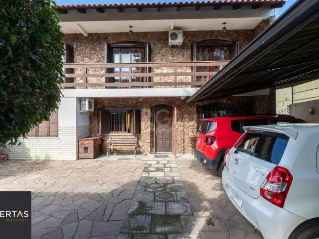 Casa / Sobrado para Venda em Porto Alegre/RS Cavalhada 5 Quartos