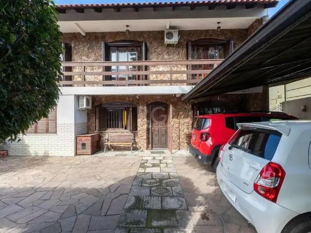 Casa / Sobrado para Venda em Porto Alegre/RS Cavalhada 5 Quartos