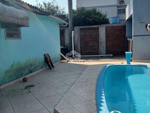 Casa / Sobrado para Venda em Porto Alegre/RS Cristal 3 Quartos