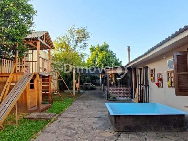 Casa / Sobrado para Venda em Porto Alegre/RS Cristal 4 Quartos