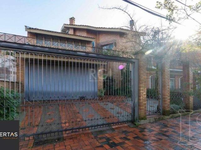 Casa / Sobrado para Venda em Porto Alegre/RS Cristal 4 Quartos