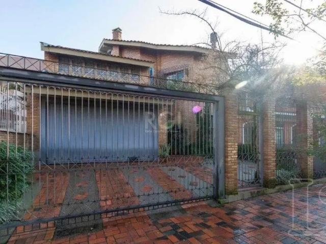 Casa / Sobrado para Venda em Porto Alegre/RS Cristal 4 Quartos
