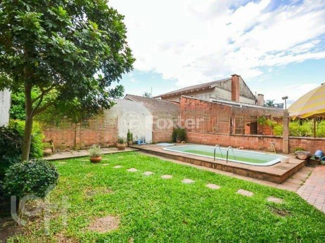 Casa / Sobrado para Venda em Porto Alegre/RS Cristal 4 Quartos