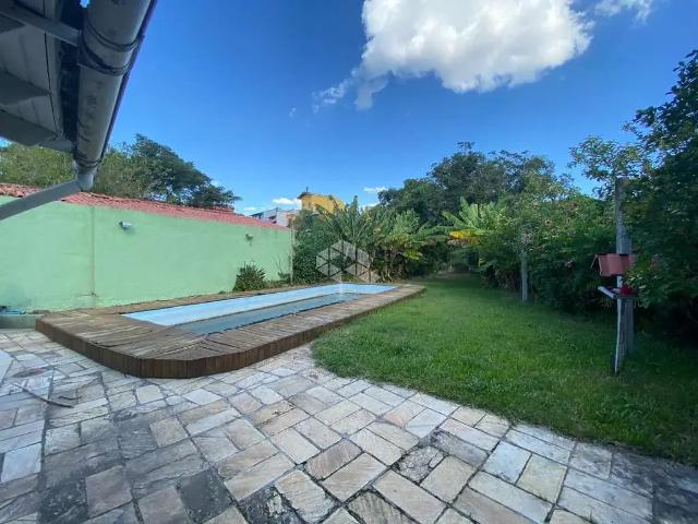 Casa / Sobrado para Venda em Porto Alegre/RS Guarujá 3 Quartos