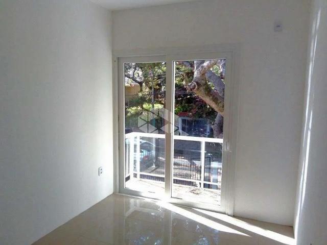 Casa / Sobrado para Venda em Porto Alegre/RS Guarujá 3 Quartos