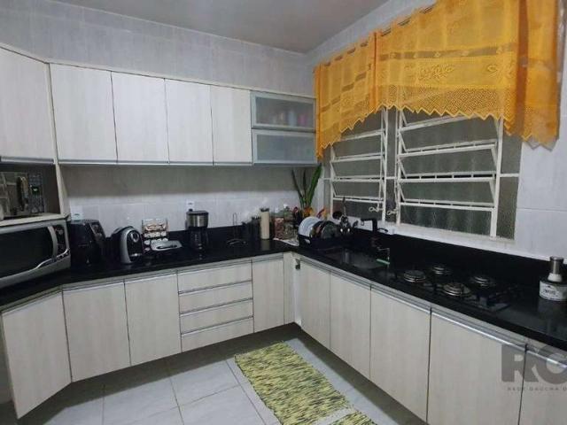Casa / Sobrado para Venda em Porto Alegre/RS Guarujá 3 Quartos