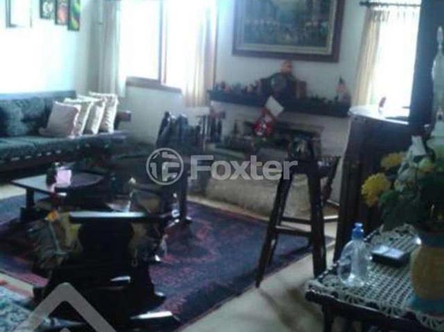 Casa / Sobrado para Venda em Porto Alegre/RS Guarujá 4 Quartos