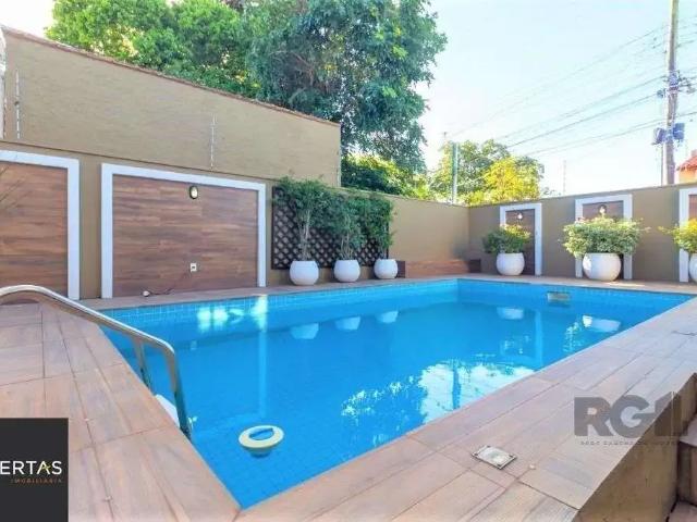 Casa / Sobrado para Venda em Porto Alegre/RS Guarujá 4 Quartos