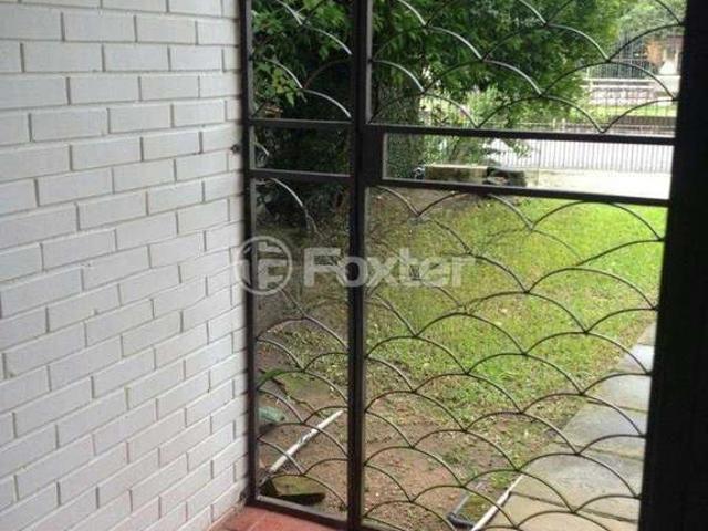 Casa / Sobrado para Venda em Porto Alegre/RS Guarujá 4 Quartos