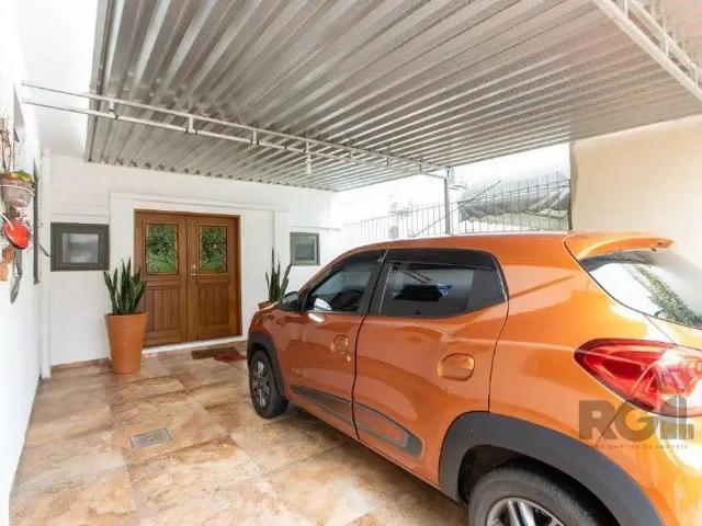 Casa / Sobrado para Venda em Porto Alegre/RS Guarujá 5 Quartos