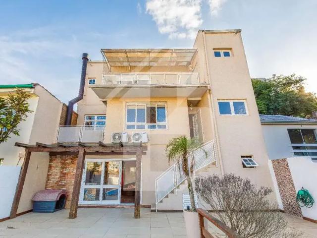 Casa / Sobrado para Venda em Porto Alegre/RS Higienópolis 3 Quartos