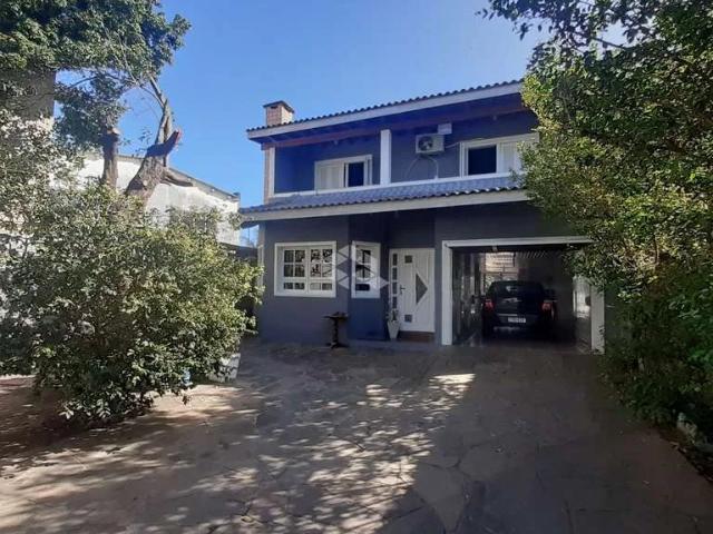 Casa / Sobrado para Venda em Porto Alegre/RS Hípica 3 Quartos