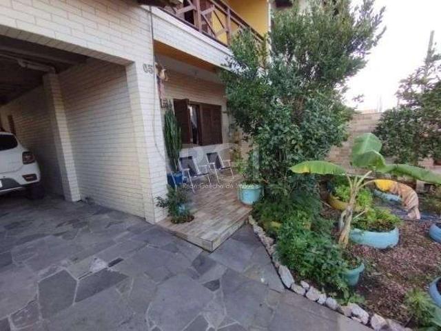 Casa / Sobrado para Venda em Porto Alegre/RS Hípica 3 Quartos