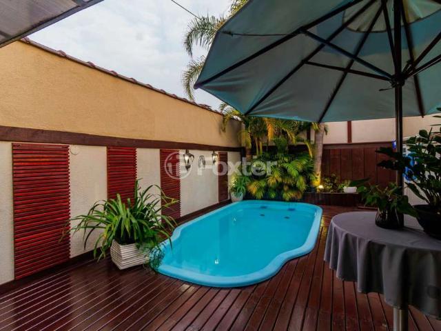Casa / Sobrado para Venda em Porto Alegre/RS Hípica 4 Quartos