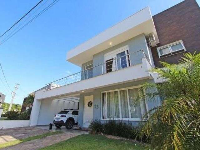 Casa / Sobrado para Venda em Porto Alegre/RS Hípica 5 Quartos