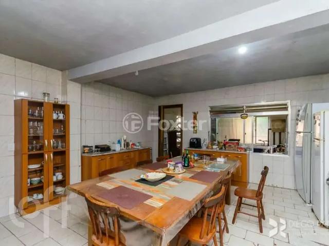 Casa / Sobrado para Venda em Porto Alegre/RS Jardim Botânico 3 Quartos