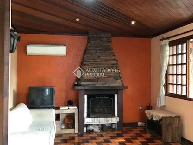 Casa / Sobrado para Venda em Porto Alegre/RS Jardim Botânico 5 Quartos