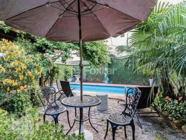 Casa / Sobrado para Venda em Porto Alegre/RS Jardim Botânico 5 Quartos
