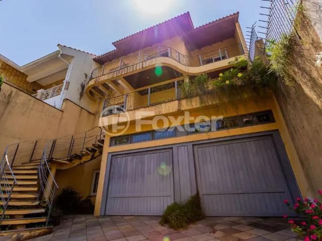 Casa / Sobrado para Venda em Porto Alegre/RS Jardim Botânico 5 Quartos