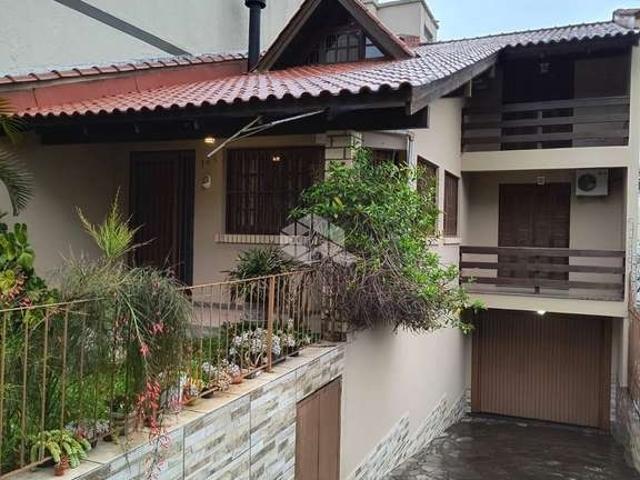 Casa / Sobrado para Venda em Porto Alegre/RS Jardim Floresta 3 Quartos