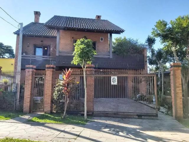 Casa / Sobrado para Venda em Porto Alegre/RS Jardim Floresta 3 Quartos