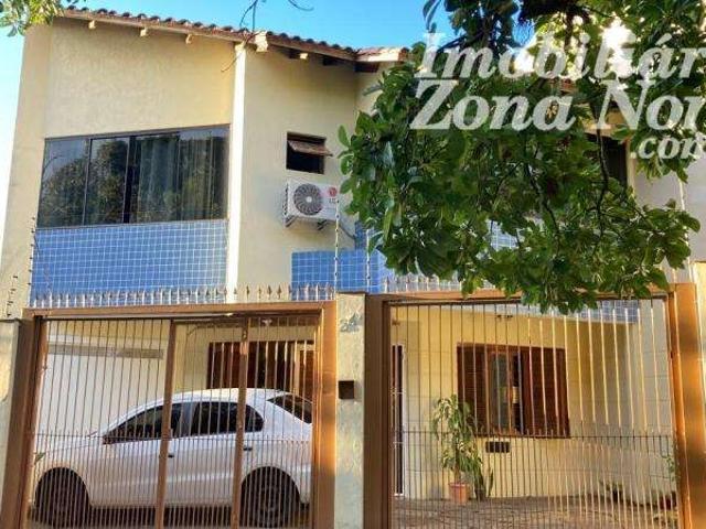 Casa / Sobrado para Venda em Porto Alegre/RS Jardim Floresta 3 Quartos