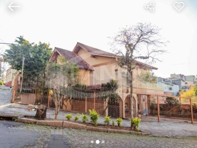 Casa / Sobrado para Venda em Porto Alegre/RS Jardim Floresta 3 Quartos