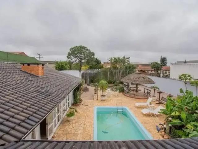 Casa / Sobrado para Venda em Porto Alegre/RS Jardim Floresta 3 Quartos