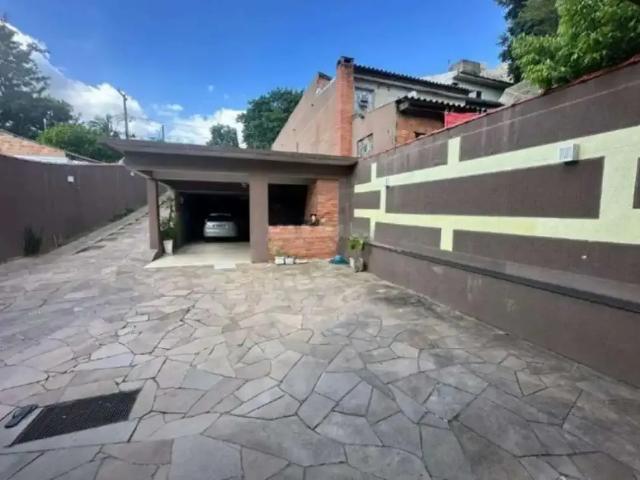 Casa / Sobrado para Venda em Porto Alegre/RS Jardim Floresta 4 Quartos