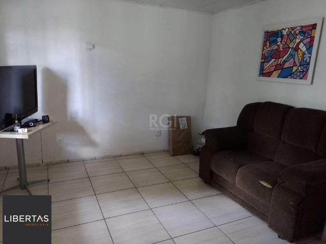 Casa / Sobrado para Venda em Porto Alegre/RS Jardim Floresta 4 Quartos