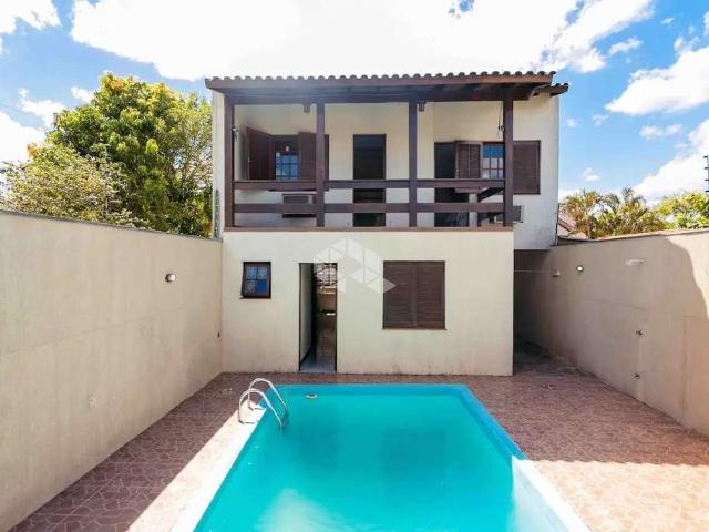 Casa / Sobrado para Venda em Porto Alegre/RS Jardim Floresta 5 Quartos