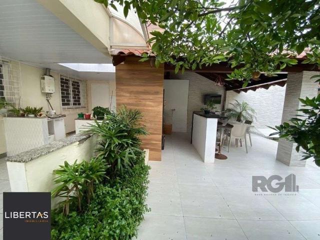 Casa / Sobrado para Venda em Porto Alegre/RS Jardim Floresta 5 Quartos