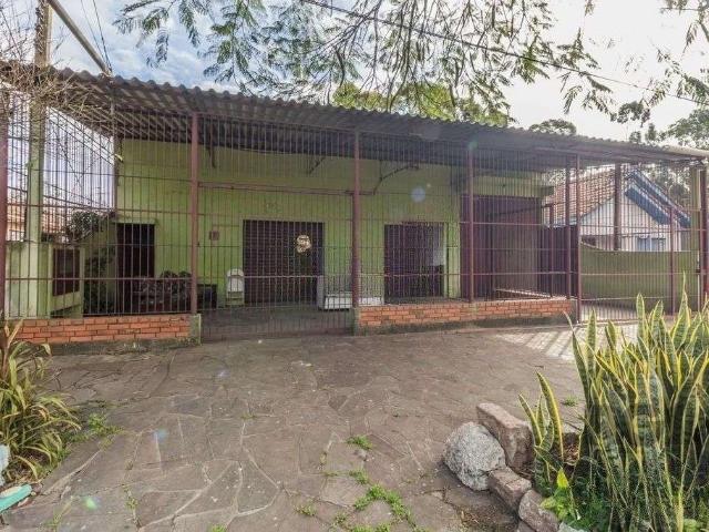 Casa / Sobrado para Venda em Porto Alegre/RS Jardim Floresta 6 Quartos