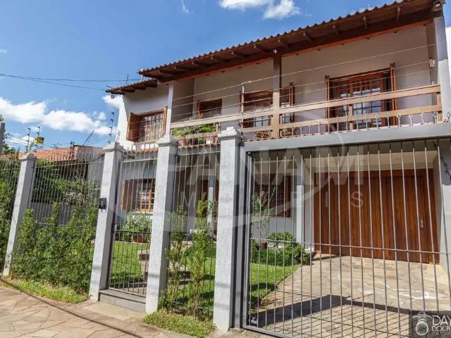 Casa / Sobrado para Venda em Porto Alegre/RS Jardim Lindóia 3 Quartos