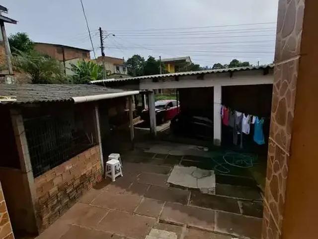 Casa / Sobrado para Venda em Porto Alegre/RS Lomba do Pinheiro 4 Quartos