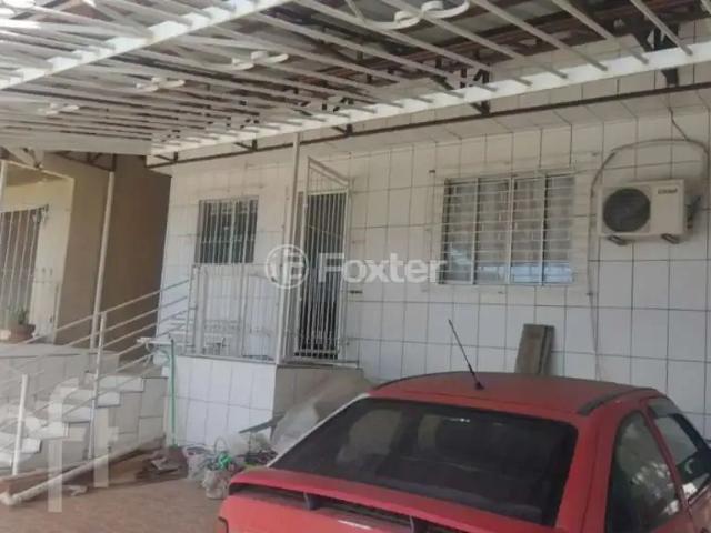 Casa / Sobrado para Venda em Porto Alegre/RS Partenon 4 Quartos