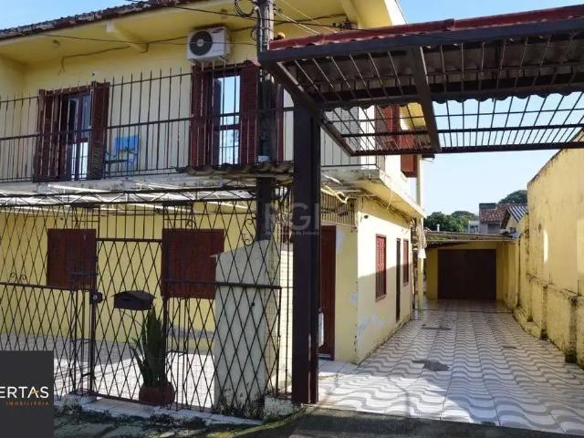 Casa / Sobrado para Venda em Porto Alegre/RS Partenon 5 Quartos
