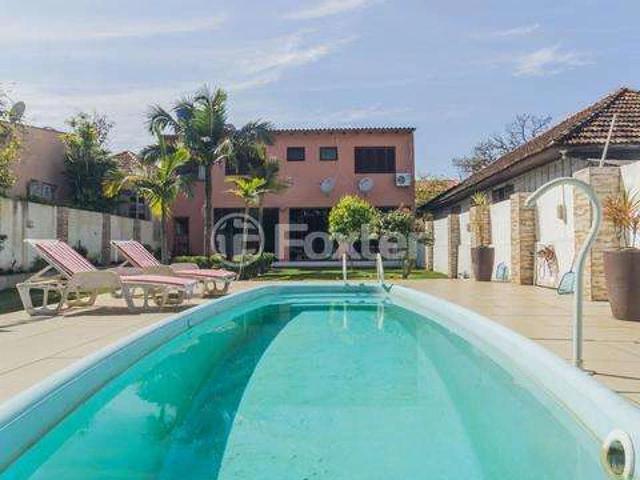 Casa / Sobrado para Venda em Porto Alegre/RS Partenon 3 Quartos