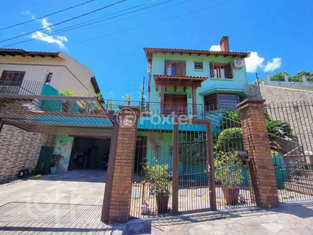 Casa / Sobrado para Venda em Porto Alegre/RS Partenon 3 Quartos