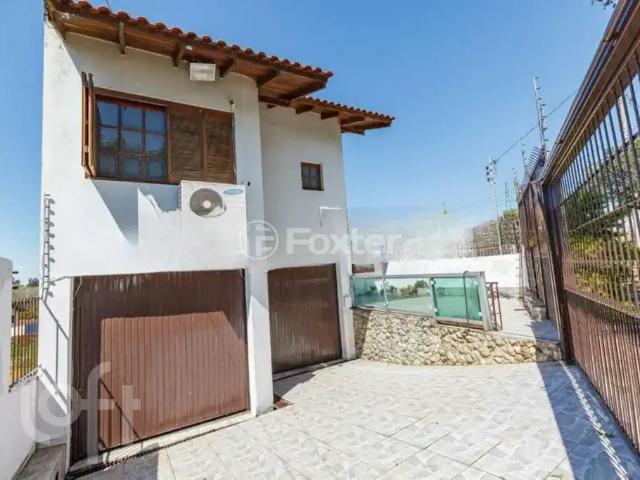 Casa / Sobrado para Venda em Porto Alegre/RS Parque Santa Fé 4 Quartos