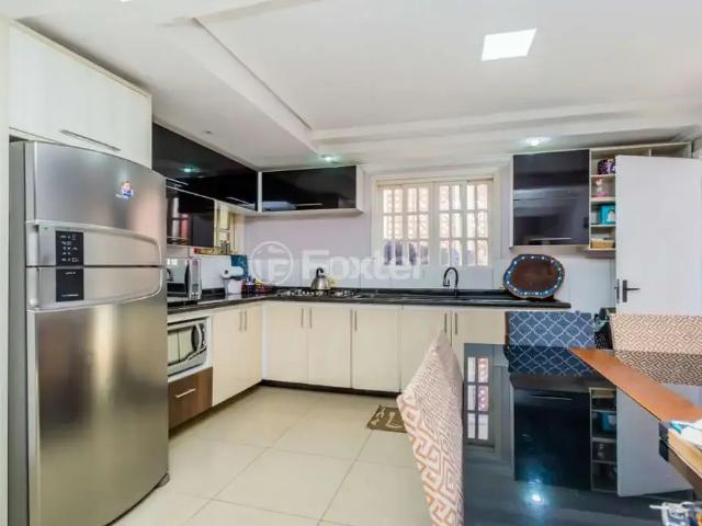 Casa / Sobrado para Venda em Porto Alegre/RS Passo da Areia 4 Quartos