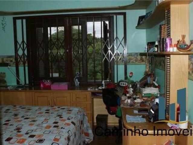 Casa / Sobrado para Venda em Porto Alegre/RS Passo da Areia 6 Quartos