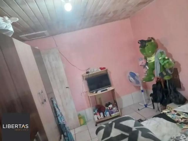 Casa / Sobrado para Venda em Porto Alegre/RS Restinga 4 Quartos